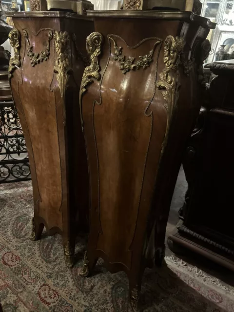 pair of antique LXV style figural bronze pedestals for indoor display