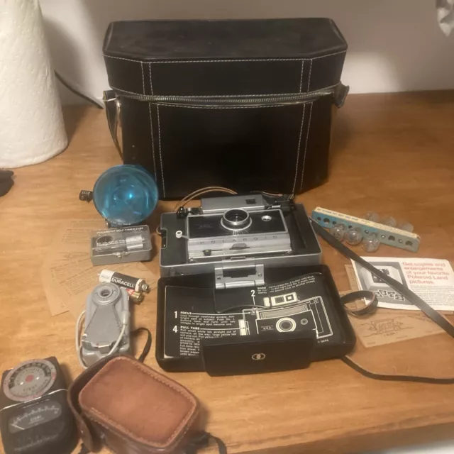 De colección Polaroid Automático 250 Cámara Terrestre Flash Bombillas Película Manuales Estuche Temporizador