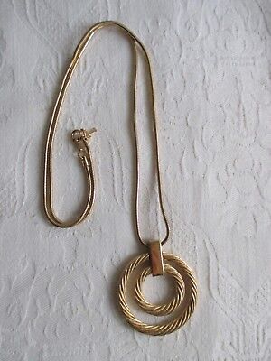COLLANA LUNGA  FIRMATA TRIFARI CROWN IN TONO ORO CON PENDENTE CIRCOLARE DOPPIO 
