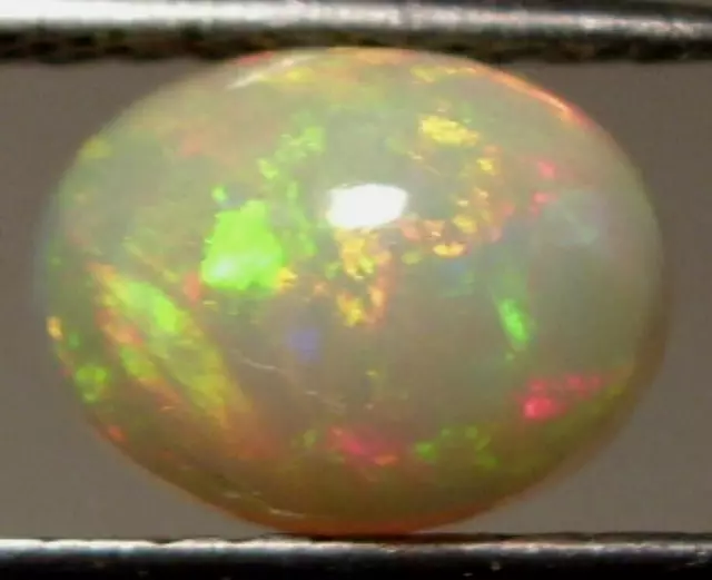 .89ct BEAUTIFUL FIRE Welo Ethiopian Opal Oval Cabochon Cut 8x6mm WoW *$1NR*