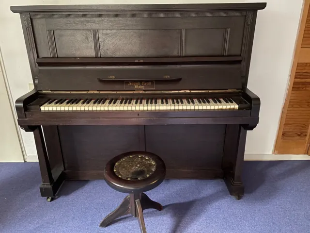 Antikes Klavier von August Kraft mit Klavierhocker