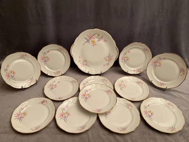 Service à dessert en porcelaine de Limoges à décor floral plat 12 assiettes 2