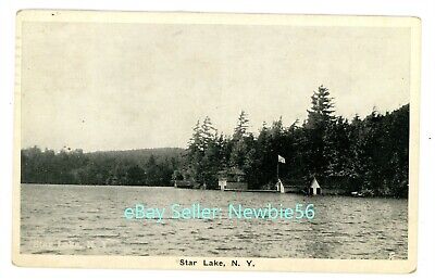 Star Lake NY - VIEW OF BOAT HOUSES ALONG SHORE - Postcard Adirondacks