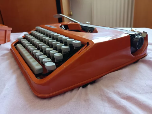 Máquina escribir Vintage naranja Hermes Baby