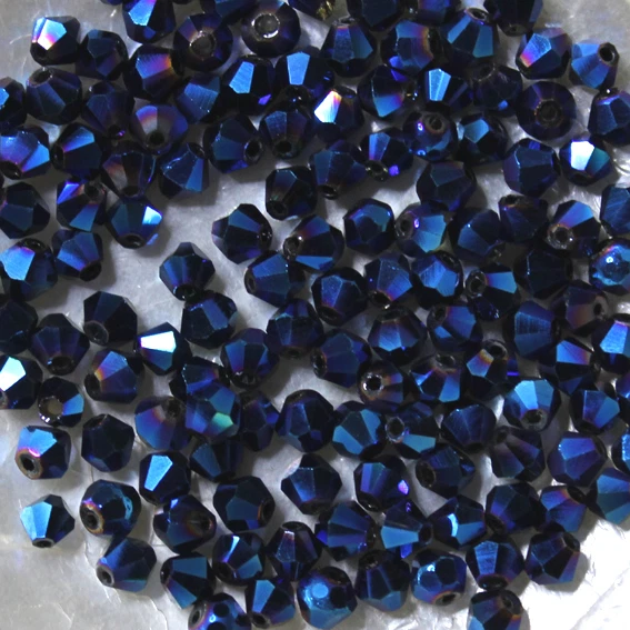 25 Perles Cristal -TOUPIES SWAROVSKI - CRYSTAL METALLIC BLUE 2X  001METB  - 4 mm