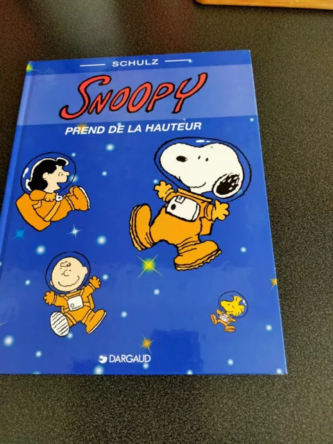 SNOOPY PREND DE LA HAUTEUR - SCHULZ - album de 1999 de 48 pages - comme neuf