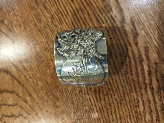 Large antique silver plated on brass Mont St Michel serviette ring