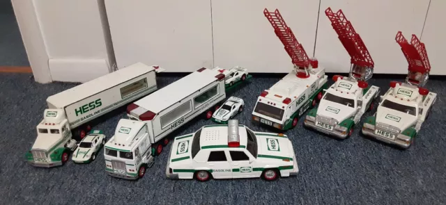 Lot 9 Hess Gas Station Toy 3 FireTrucks,1 Police,2 Car Carriers-3 Cars 1992-1997