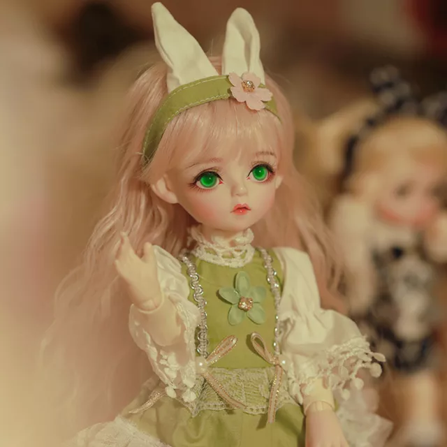 Bambola 1/6 BJD altezza 30 cm bambola ragazza con vestiti abiti verdi occhi trucco aggiornamento