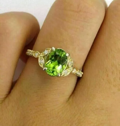 1.50Ct Oval Cut Lab Created Peridot Eternity Wedding Ring 14K Yellow Gold Plated