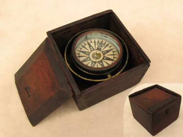 19th century Mariners gimbal compass mounted in mahogany case.