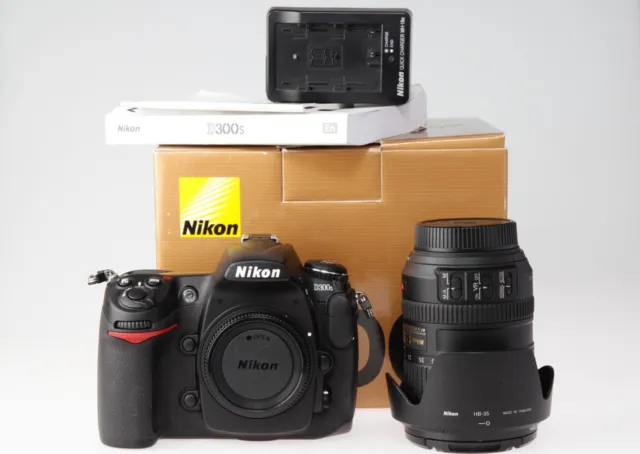 Nikon D300s digital SLR + Nikkor 18-200mm zoom lens low shutter count 5k box etc
