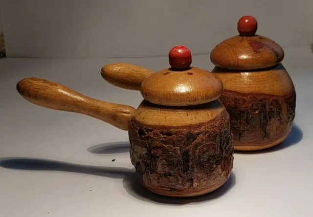 Vintage Wooden Cooking Pot Salt & Pepper Shakers with unique bark exterior.