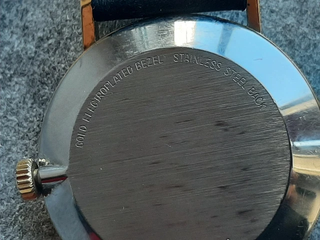 ZENITH-MOVADO MUSEUM 20.0040.366 QUADRANTE DORATO; MANUALE Zenith 2572. 35 mm.  12
