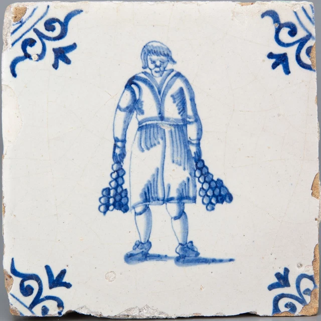 Nice Dutch Delft Blue tile, onion seller, mid 17th century.