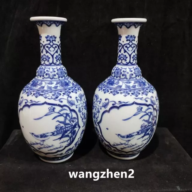 A pair of exquisite Chinese Blue and white pottery flower and bird vases 27.5cm