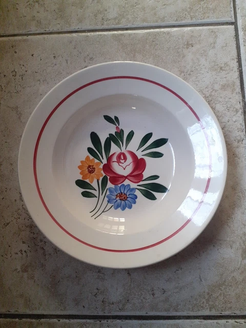 Plat creux en faïence signé PB Limoges modèle Taurion