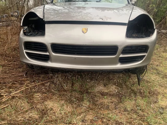 03-06 Porsche Cayenne front bumper assembly WITH grilles + headlamp washers