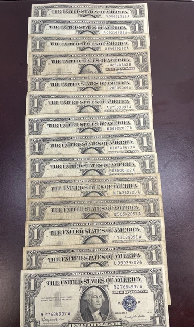 1957 series A, B, C $1 silver certificate blue seal notes.. Set of 14