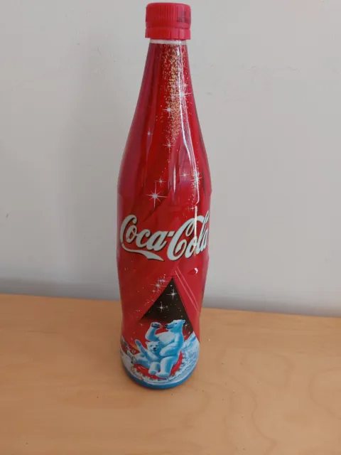 # Bouteille Coca-Cola 1L série limitée 2002 PIN ' UP 60   comme neuve #