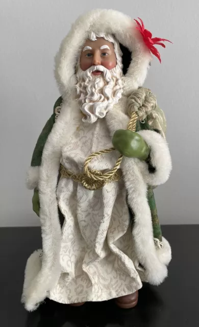 Clothtique Possible Dreams Victorian Traveler Green Coat Santa with Sack 11 inch