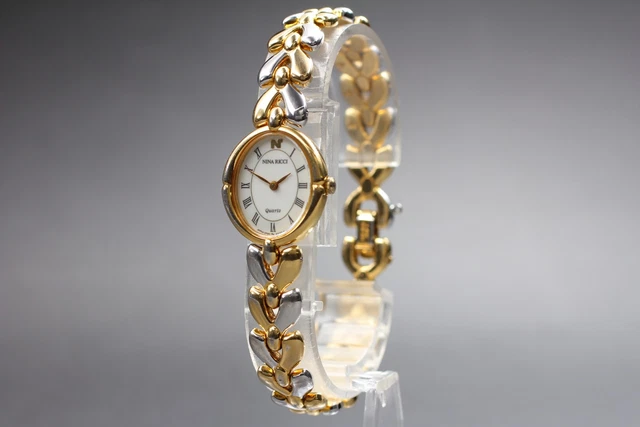 Montre Vintage Nina Ricci 2004 – Cadran Digital LED, Boîtier Acier, Bracelet Cuir Vert – Avec Coffret