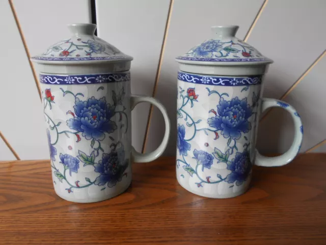 CHINESE TEA INFUSER MUGS pair of porcelain mugs ORIENTAL blue flower pattern