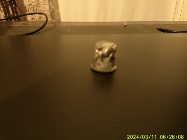 Pewter Minnesota Thimble with a Lion Pressed to it