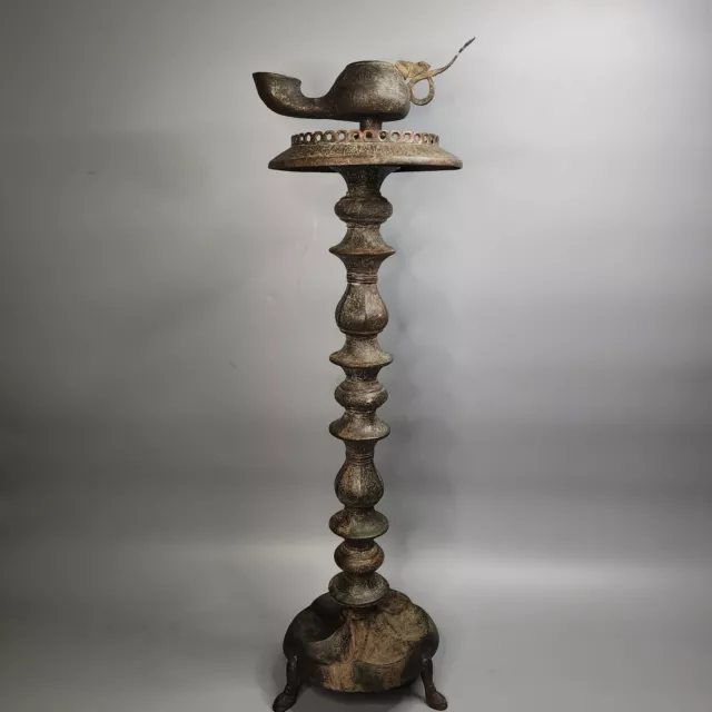 An Islamic Persian Seljuk Bronze Oil Lamp With Stand.