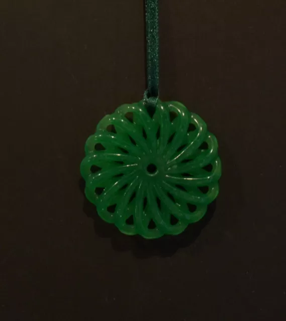 Chinese Finely Carved And Pierced Green Jade Chrysanthemum Head Pendant