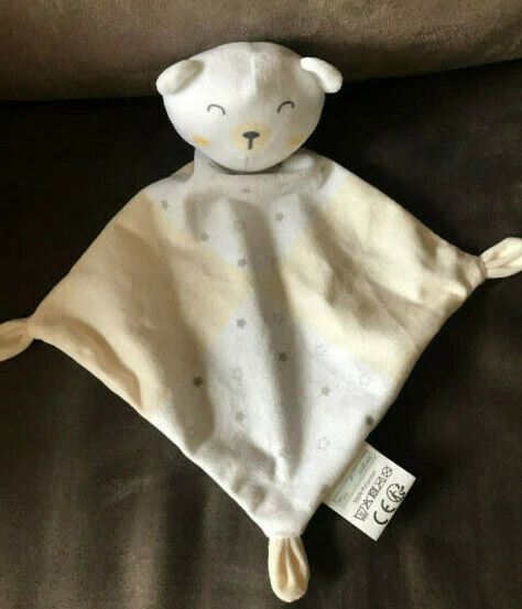 Doudou  " mes petits cailloux "  ourson plat blanc avec étoiles grises