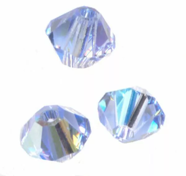 site parisien..20 PERLES TOUPIES SWAROVSKI   5mm   LIGHT SAPPHIRE AB