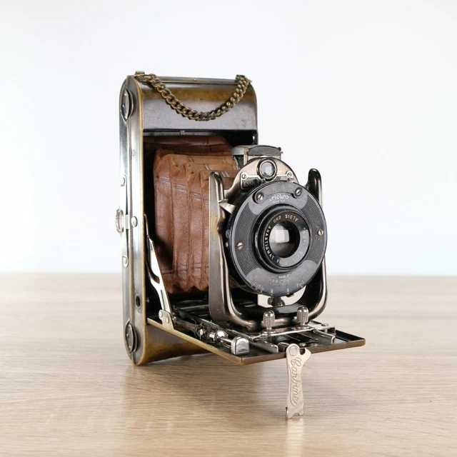 A Houghton-Butcher Ensign watch pocket carbine tropical model camera, cased, and an Ensign carbine t