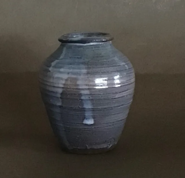 Studio pottery miniature vase— signed