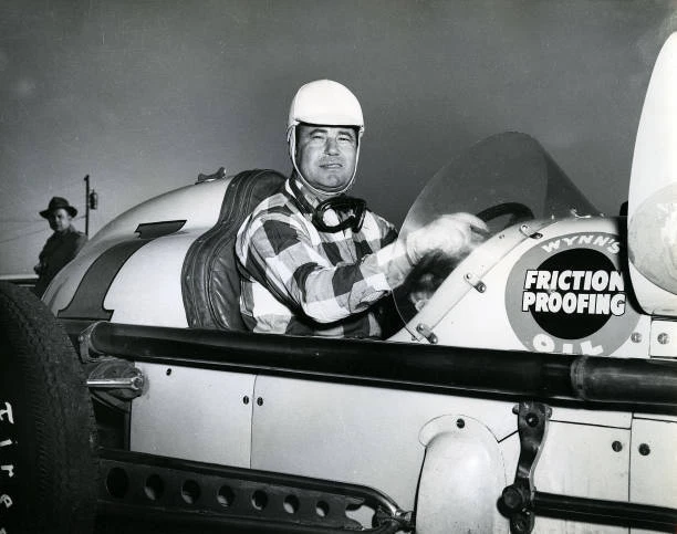 Joie-Chitwood-poses-Jim-Robbins-owned-1948-Kurtis-1000.webp