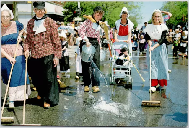 Holland Michigan Street Scrubbing Tulip Time Dutch Costumes USA Vintage Postcard