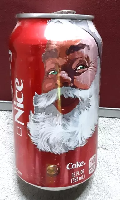 2016 Coca Cola Santa Claus Naughty Nice Soda can opened