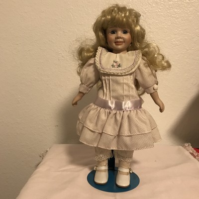 14 inch Marian Yu Porcelain Doll per-owned
