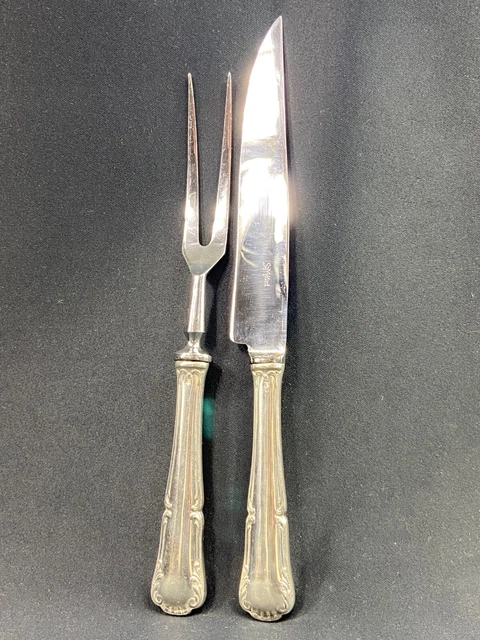 SAINT MEDARD - Ménagère en métal argenté modèle uniplat comprenant 12