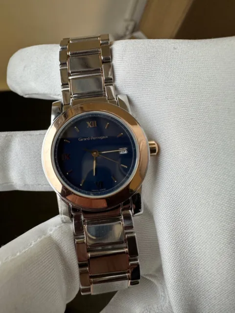 Girard Perregaux Lady 700 steel/gold quartz Blue dial 29mm Ladies watch