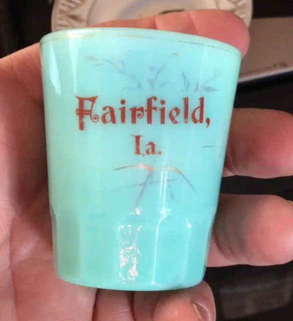 1910’s GREEN GLASS SHOT FAIRFIELD IOWA FLUTED BASE . SOUVENIR , IA ADVERTISING .