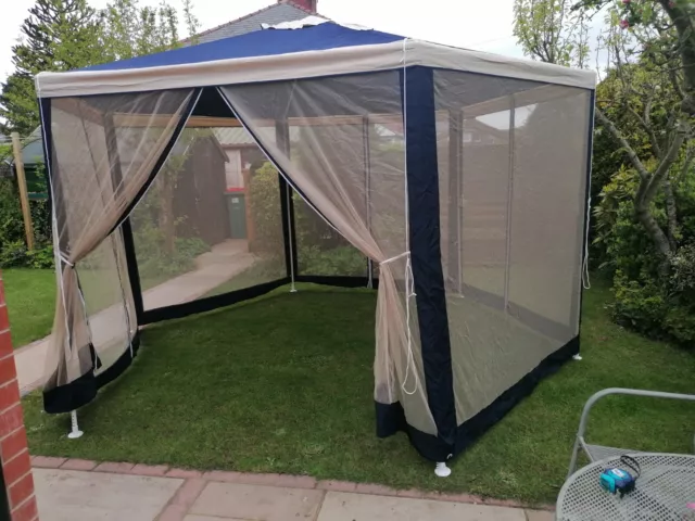 4m Blue hexagonal garden gazebo with side panels (Argos)