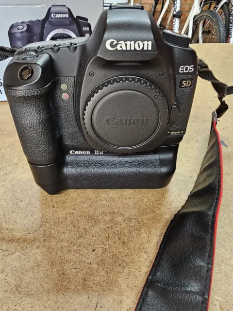 Canon EOS 5D Mark II 21.1MP Digital SLR Camera with Canon battery grip.