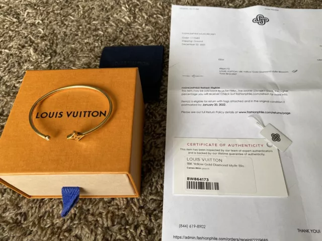 LOUISVUITTON, 18K yellow gold Louis Vuitton Idylle Blossom bangle  featuring a 0.06 carat round brillian…