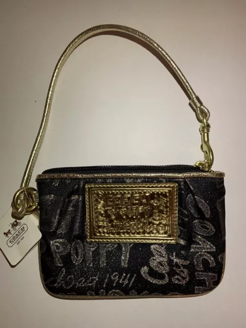 Coach Poppy Story Patch Black Gold Wristlet 44070 New.