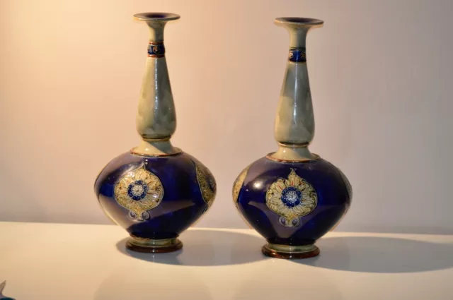 A large pair of early 20th century Royal Doulton stoneware vases, of onion form