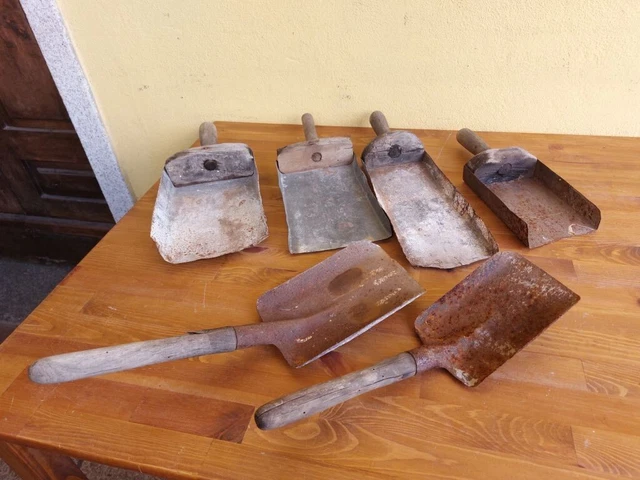 Un Ferro Di Fuoco E Una Piccola Pala Sono Vicino Alla Fornace Immagine Stock - Immagine Di Pala - Foto 2