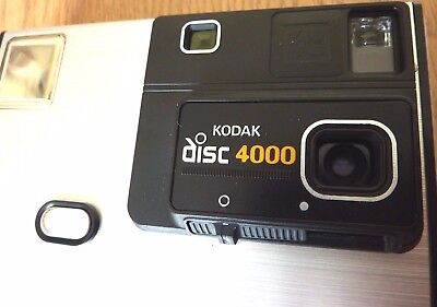 Cámara Kodak Disc 4000 Vintage Años 80 utiliza película de disco con estuche y manual hecha en EE. UU.