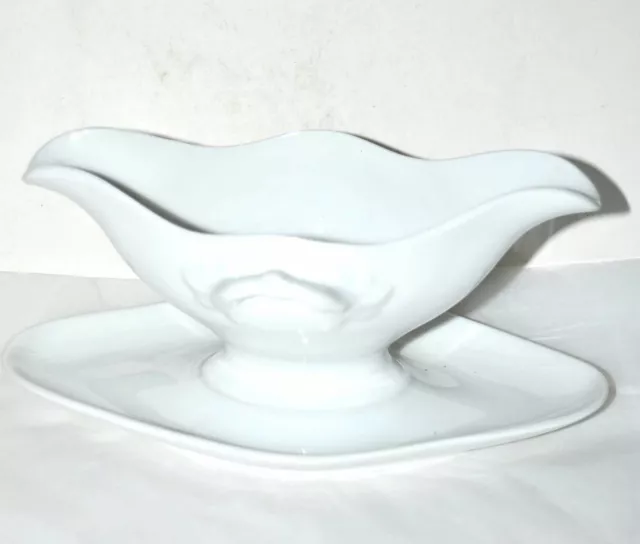 Saucière ancienne en porcelaine de Paris 19e siècle Porcelaine blanche moulé uni