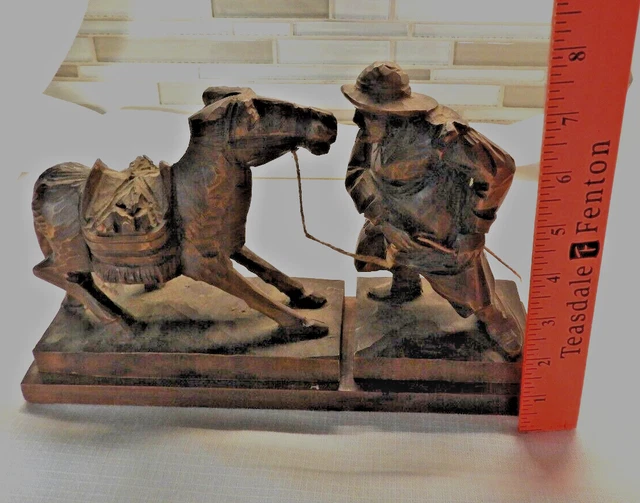 Old Folk Art Hand Carved Wooden Man and Stubborn Mule Figures on a Wooden Base